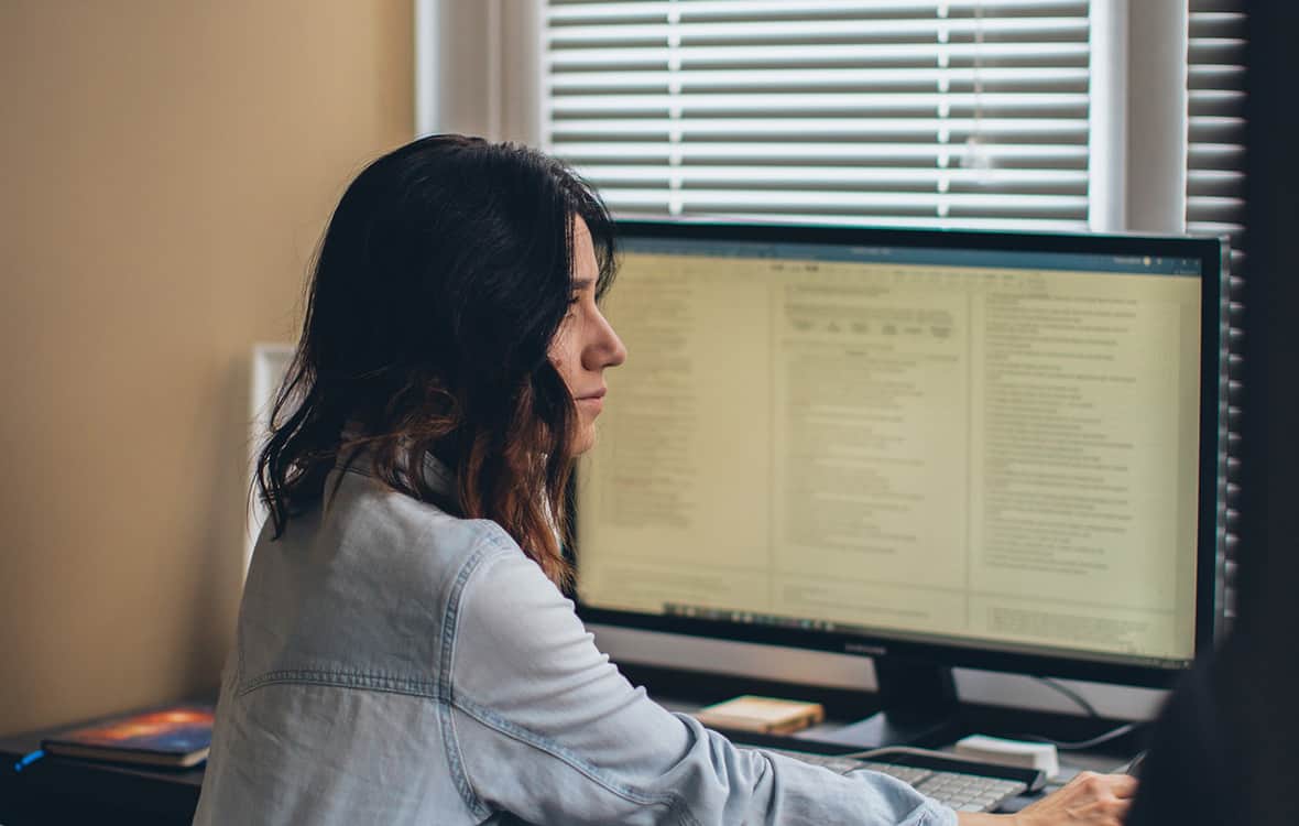 Woman with a computer using email automation software